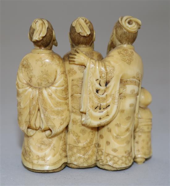 A Japanese ivory okimono of three sages and two attendant children, Meiji period, height 5.9cm